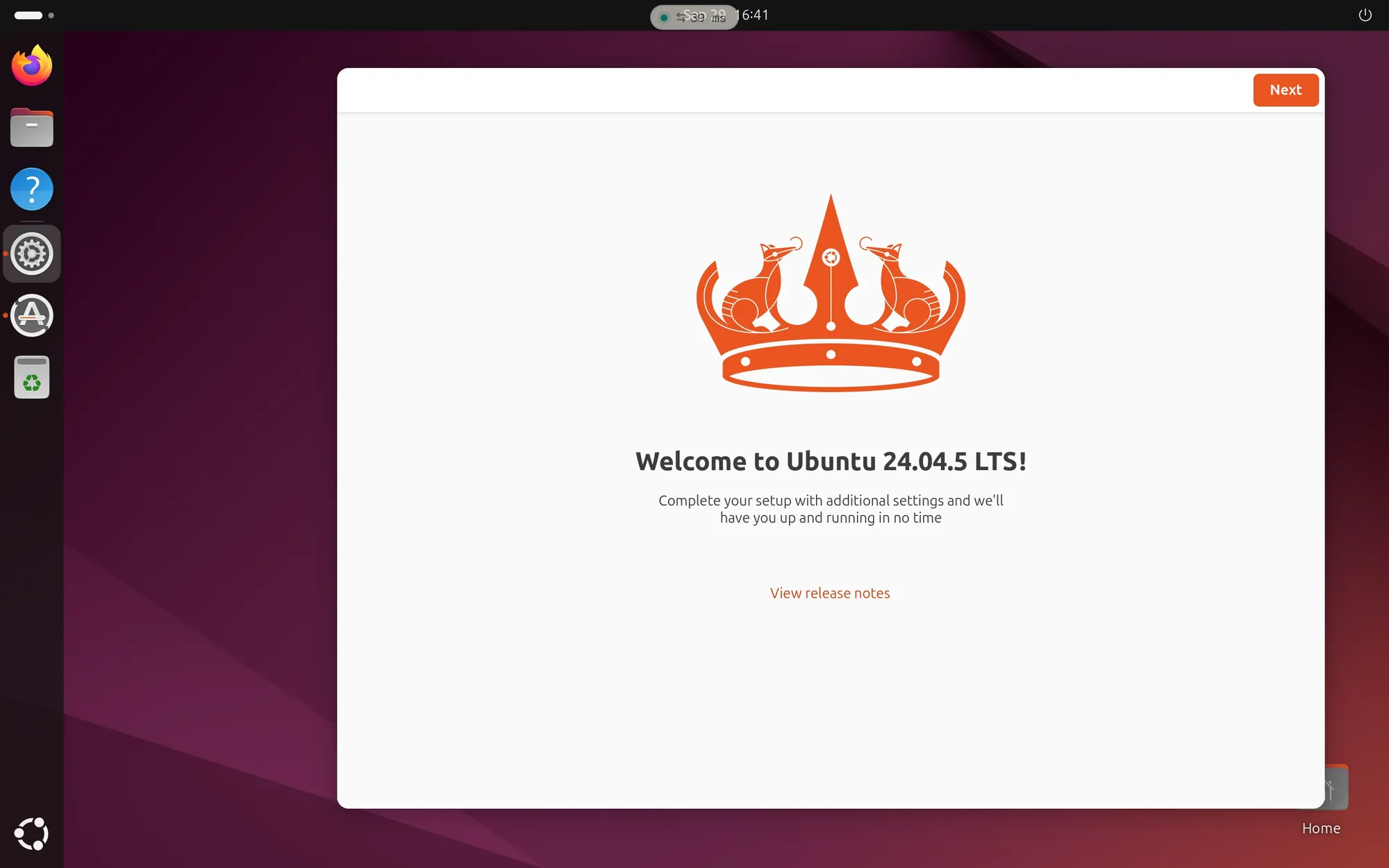 A session in the browser filled with the computer’s Ubuntu desktop, the session bar at the top and Ubuntu’s welcome window reading Welcome to Ubuntu 24.04.5 LTS! with an orange Next button.