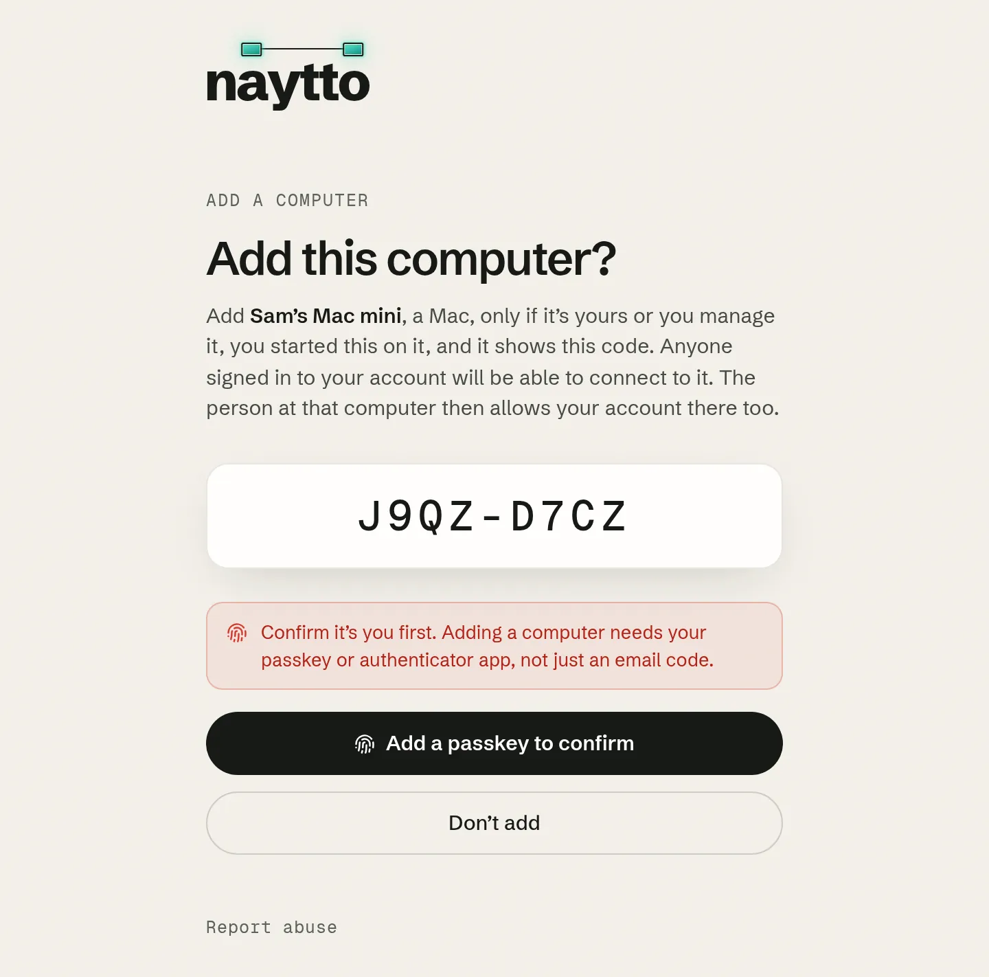 The Add this computer? page with a red notice, Confirm it’s you first, and the button now reading Add a passkey to confirm.