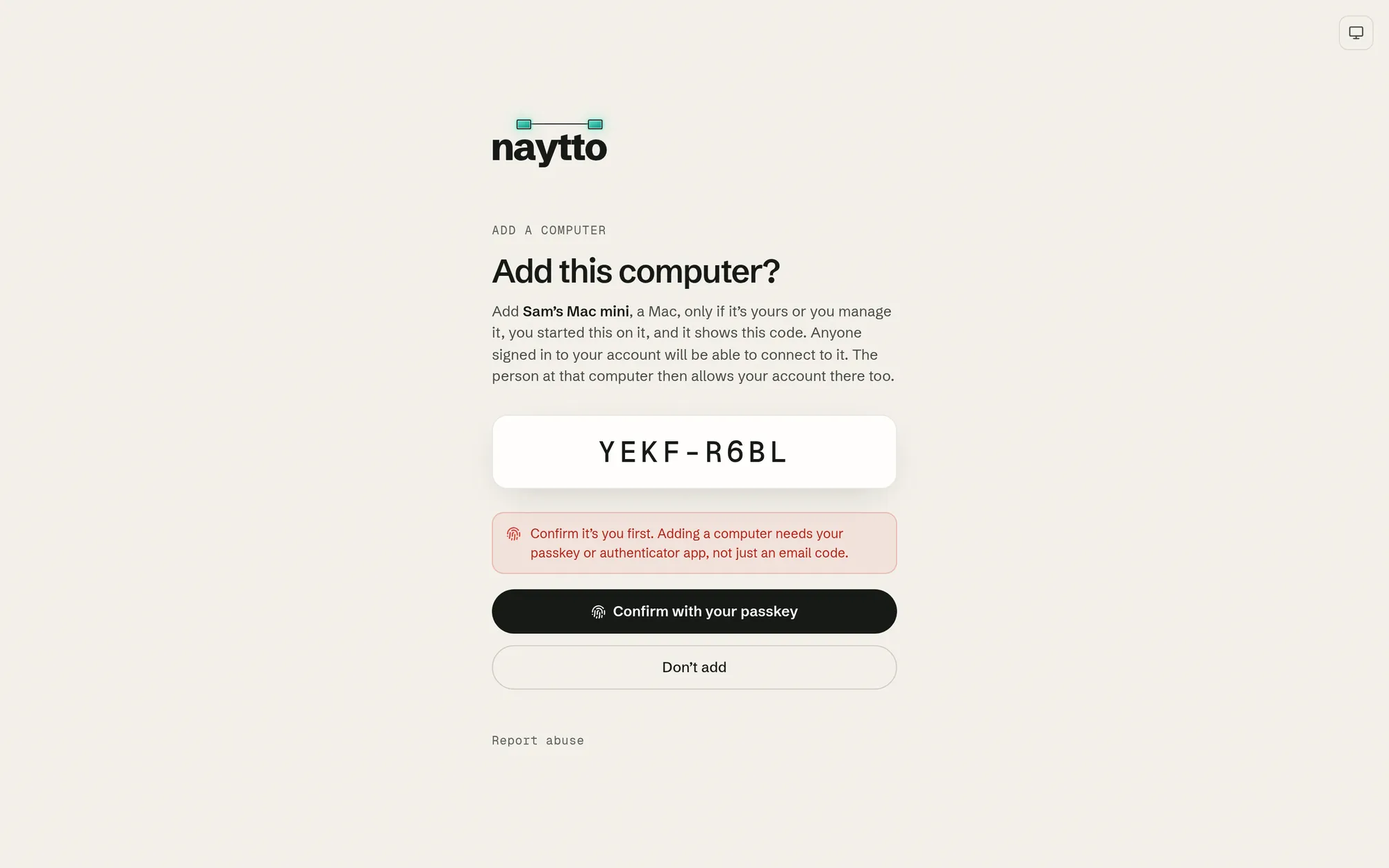 The Add this computer? page with a red notice, Confirm it’s you first, and the button now reading Confirm with your passkey.
