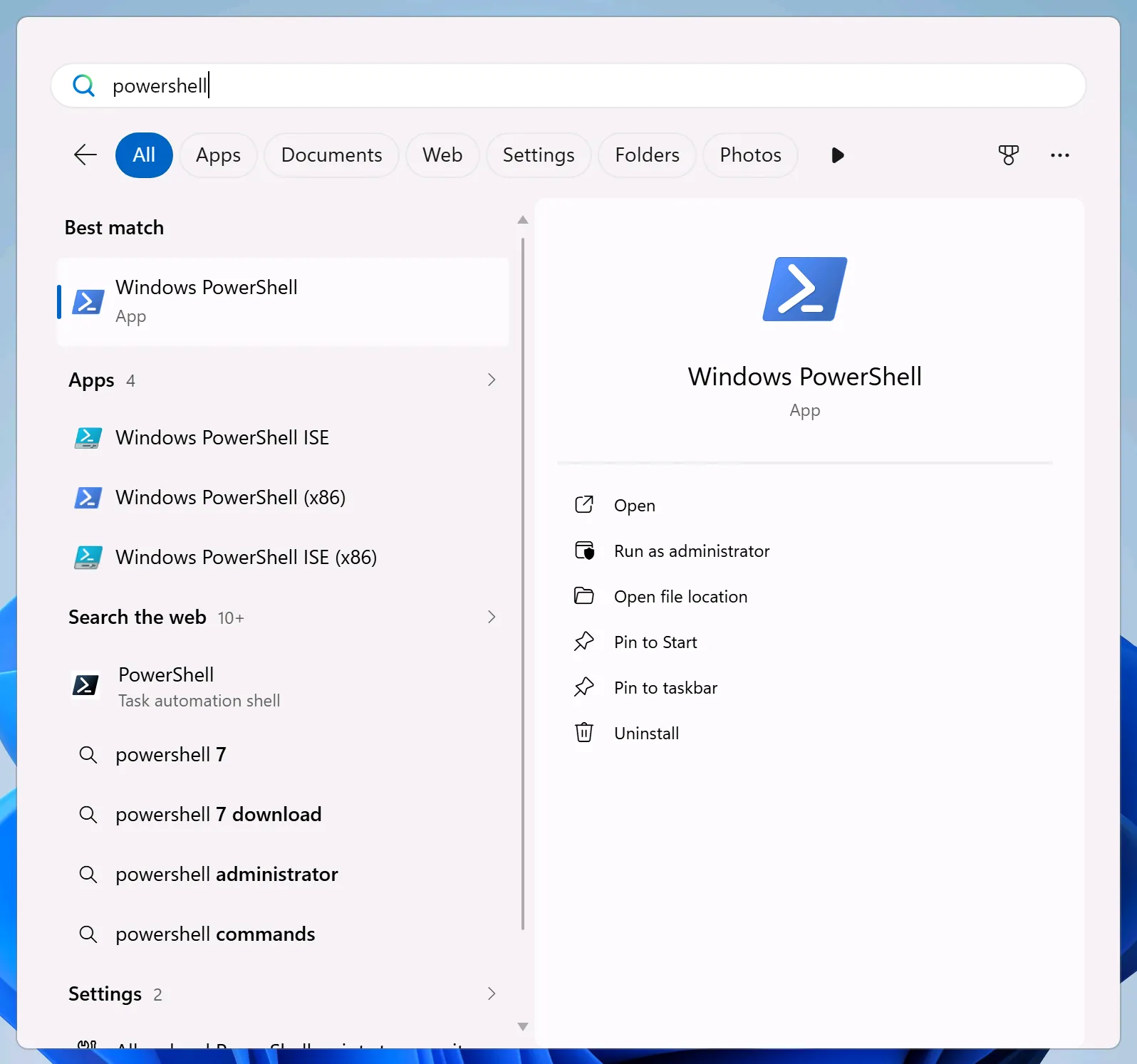 Windows’ Start menu with powershell typed in the search box, Windows PowerShell as the best match, and Open and Run as administrator on the right.